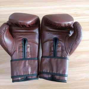 Gants de boxe de haute qualité avec support de poignet Idéal pour la salle de sport et l'utilisation à domicile Service OEM disponible - Product Image 3
