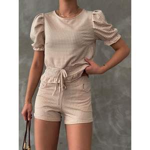 Conjunto de Shorts Mini para Mujer Topshow al por Mayor con Estampado de Piedras - Product Image 1