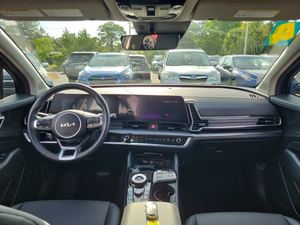 Bleu 2025 Kia Sportage hybride SX-Prestige AWD utilisé avec les sièges en cuir système de navigation démarrage à distance toit ouvrant Android Auto - Product Image 6