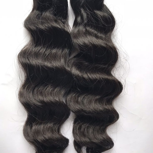 Wholesale Raw Natural Wavy Indian <b>Remy</b> <b>Hair</b> <b>Extensions</b> 100% Cuticle Aligned Machine Double Weft Curly Human <b>Hair</b> Bundles - Product Image 2