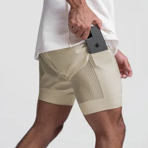 Pantalones cortos de entrenamiento con panel de malla OEM, bolsillo con cremallera, transpirables, personalizados, pantalones cortos de doble capa para hombres