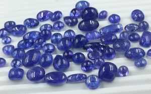 Vente en gros de cabochon de tanzanite bleue de qualité supérieure de 8mm en forme de poire ovale bleu naturel bijoux en pierres précieuses d'apatite en vrac - Product Image 2