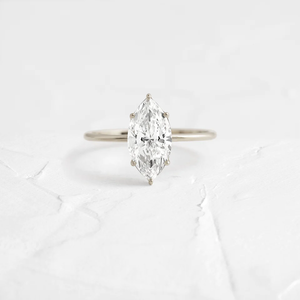 Alta calidad Fancy VVS Moissanite 1.00CT Marquise Cut Compromiso/Anillo de bodas Último diseño de solitario simple Punta de oro rosa - Product Image 1