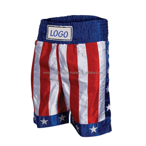 กางเกงชกมวยไทย MMA สีเหลืองแบบกำหนดเอง ผ้าซาติน ระบายอากาศได้ดี น้ำหนักเบา พิมพ์ลายแบบซับลิเมชั่น ปักลาย สำหรับคิกบ็อกซิ่ง มวยไทย 100% - Product Image 3