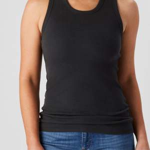 Débardeur de performance sans manches pour femmes, évacuant l'humidité et léger, pour le yoga, la salle de sport et le fitness. - Product Image 6