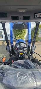 รถแทรกเตอร์ขนาดเล็ก TH5420 พร้อมชุดตักดินหน้าปรับระดับอัตโนมัติ เครื่องยนต์ดีเซล 40 แรงม้า ปั๊มมอเตอร์ ระบบส่งกำลัง HST 3 ระดับ ดิจิตอล - Product Image 4