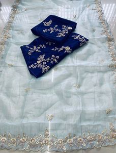 Hermoso y Elegante Sari de Seda Organza Suave de Diseño Premium con Bordado y Borde Calado con Blusa de Satén de Bangalore - Product Image 5