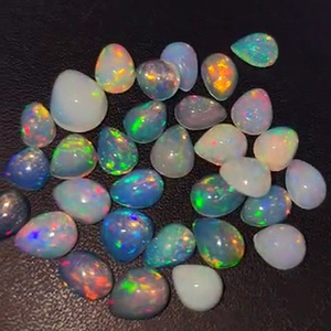 229 Uds ópalo etíope Natural 7x5 8x6 9x7mm pera ovalada 6 7 8mm cabujón redondo 202 Cts lote Iroc ventas calidad cabina de piedras preciosas US $159 - Product Image 1