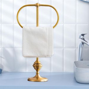 Handcrafted brass <b>towel</b> stand suitable for stylish washrooms providing sturdy support for bath <b>towels</b> in luxury spaces - Product Image 2