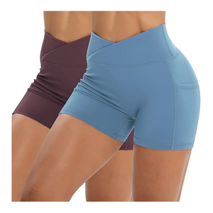 Yoga elástico con bolsillos laterales Pantalones cortos de Yoga para Mujeres Cintura cruzada Gimnasio activo 100% Poliéster con alta y calidad premium - Product Image 1