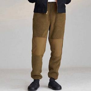 กางเกงวิ่งแบบมีซิปครึ่งขาของผู้ชายกางเกงผ้าฟลีซทรงหลวมกางเกงกีฬาสำหรับผู้ชายตรงลายทางแบบโค้งผลิตตามสั่ง - Product Image 3