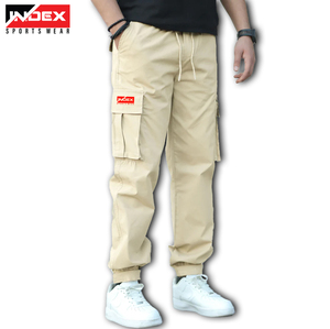 Pantalones informales ligeros de ajuste regular cargo personalizados OEM para hombre con múltiples bolsillos logotipo personalizado transpirable 100% algodón - Product Image 1