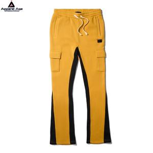 กางเกงกีฬาผ้าฝ้ายลำลองผู้ชายฤดูใบไม้ร่วงสีพื้นน้ำหนักเบามีกระเป๋ารูดแบบเรียงซ้อนออกแบบโลโก้ได้ตามต้องการ - Product Image 1