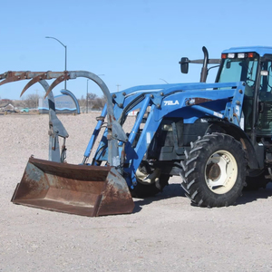 Tracteur HOL LAND TM125 d'occasion, modèle 1051, avec chargeur auto-nivelant 72LA, godet à fixation rapide de 96 pouces avec grappin - Product Image 3