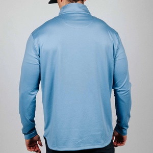 ... Top de golf con cremallera de Cuarto hecho con jugadores atléticos en mente, tela suave transpirable ideal para el movimiento durante el swing - Product Image 1