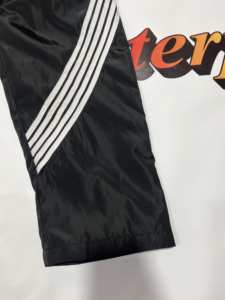 Pantalon coupe-vent baggy pour homme 100% coton Pantalon de survêtement à jambes larges écologique Bandes brodées en nylon et polyester pour sublimation - Product Image 5