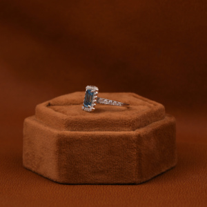 Fashionable Solitaire Blue <b>Emerald</b> Cut Lab Grown Diamond With Tiny Round Cut Diamond Halo Engagement <b>Ring</b> in 18KT Solid Gold - Product Image 2