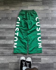 กางเกงวิ่งออกกำลังกายผ้าไนลอนน้ำหนักเบาสำหรับผู้ชายกางเกงขาบานระบายอากาศแห้งเร็วกันน้ำซิลค์สกรีนไซส์ใหญ่พิเศษ - Product Image 4