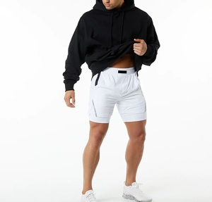 Venta al por mayor de pantalones cortos deportivos 2 en 1 para hombre con logotipo personalizado para gimnasio cintura media doble forro estilo deportivo parte inferior de entrenamiento personalizable - Product Image 4