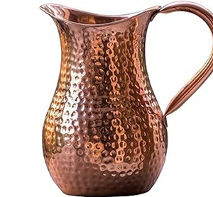 Table à manger décorative Pièce maîtresse en métal Tasse en cuivre antique fini à la main Pichet au design martelé - Product Image 1
