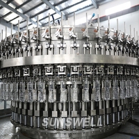Machine automatique de remplissage et de bouchage de bouteilles de boissons gazeuses, d'eau, de bière, de fûts