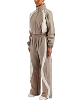 Nouvelle conception, ensemble de survêtement coupe-vent pour femme en nylon froissé brodé, grande taille, avec haut court et pantalon de jogging