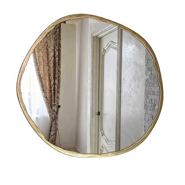 Cermin dinding bingkai asimetris akan memberikan suasana yang benar-benar berbeda pada estetika dekorasi Interior rumah mewah Anda