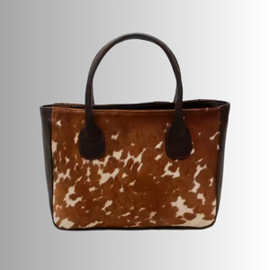 กระเป๋าถือหนังแท้สำหรับผู้หญิงมีสไตล์ใหม่กระเป๋าโท้ทหนังวัวไฮด์เฮรอนขนวัวแท้กระเป๋าเดินทางสำหรับใส่แล็ปท็อป100% ของแท้แฮนด์เมด - Product Image 1