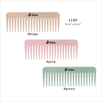 Brosse à cheveux ovale grande taille vegan avec embouts ornés de pierres, poils en nylon, matériaux plastique et TPO pour démêler et prendre soin des cheveux