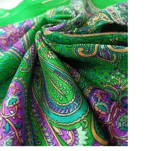 custom made silk screen printed scarves in green color made with indian paisley themed prints ideal for use by fashion designers