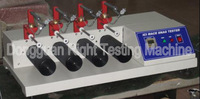Máquina de prueba de resistencia a pilling y enganches textiles de 4 estaciones Probador de gancho de tela