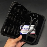 Le kit professionnel d'outils d'extensions de cheveux noirs mats comprend une séparation en boucle et une pince à deux trous pour les cheveux à double trame Remy Machine