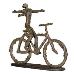 Table Centerpiece <b>Decorative</b> Brass Antique Finished Bicycle And Human Designer Metal Sculpture From India In Impressive Price - Product Image 1