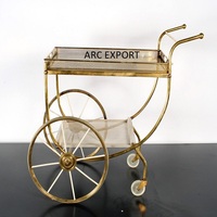 Grand chariot de service moderne en métal argenté avec miroir transparent brillant, élégant et Antique pour le dîner et le déjeuner