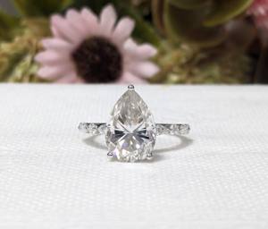 แหวนหมั้นเพชรทรงลูกแพร์ 4 กะรัต ผลิตในห้องปฏิบัติการ ประดับด้วยเพชรแบบซ่อนรอบวง ตัวเรือนทองคำขาว 14K สำหรับเครื่องประดับสตรี ของขวัญวันวาเลนไทน์ - Product Image 5