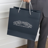 Tas Hadiah Mewah Biodegradable Berembos Logo Kustom Desain Bunga Biru Tua Pegangan Pita Flexiloop Kertas Seni Jam Tangan Kacamata