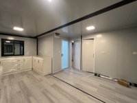 Maison conteneur extensible moderne de 30 pieds (9,14 m) et 56 m² avec deux ailes et un grand espace de vie