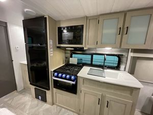 New Design X-Lite Travel Trailer 4 Person Aluminum Lightweight Modern Slide-Out <b>Kitchen</b> Black Exterior - Product Image 6