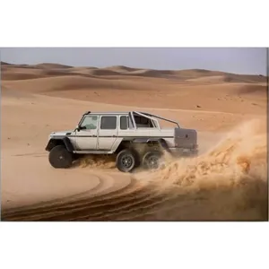 Impression sur toile Fida Mercedes G 6x6 agitant la poussière sur les dunes du désert - Product Image 6