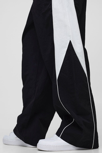 OEM/ODM 100% Nylon al aire libre Ripstop pantalones de hombre lavado a medida tela cortavientos de moda con paneles laterales transpirable hombre pantalón - Product Image 5