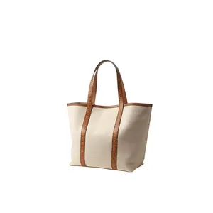 Elegant Beige <b>Canvas</b> Tote Bag with Brown Leather Detailing Wholesale - Product Image 1