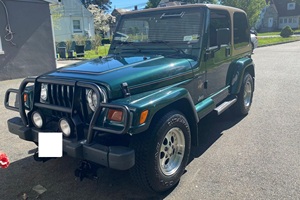 JEEP WRANGLER SAHARA 4X4 USADO DE 1999, CON VOLANTE A LA IZQUIERDA/DERECHA - Product Image 2