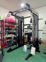 Machine de Smith d'entraîneur multifonctionnelle de nouvelle conception avec la basse barre de traction de Lat et la corde de Triceps