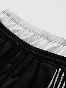 Conjunto de chándal con panel lateral en blanco y negro para hombre, Camiseta con estampado gráfico con detalle lateral doble y Jogger elástico, logotipo personalizado, atuendo conjunto - Product Image 5