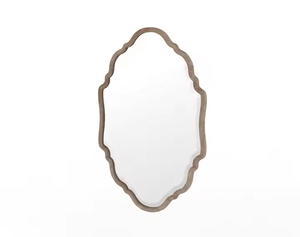 El espejo con marco de madera está hecho de madera de origen sostenible con intrincados diseños tallados a mano por Azora Industries - Product Image 1