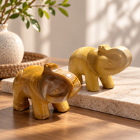 Sculpture d'éléphant en calcite jaune, figurine d'animal en pierre précieuse dorée polie avec de magnifiques motifs pour la décoration intérieure et les cadeaux