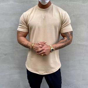 Courbe élastique bas à manches courtes T-Shirt d'entraînement spectacle musculaire entraînement Fitness hommes coupe régulière Sport Gym chemise tricoté formel - Product Image 1