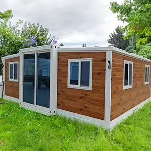 Maison préfabriquée à double aile pliable sur mesure Chambre pliante double aile préfabriquée de luxe en métal avec cadre en acier