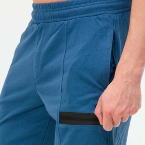 กางเกงขาสั้นผ้าโพลีเอสเตอร์ทรงหลวมลำลองสำหรับผู้ชายกางเกงขาสั้นสำหรับใส่วิ่งเล่นกีฬาทำจากผ้าโพลีเอสเตอร์มีกระเป๋าสีฟ้าออกแบบโลโก้ได้ตามต้องการ - Product Image 6