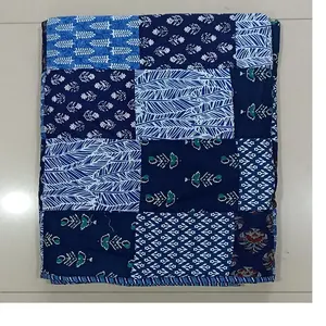 customized blue coloured recycled patchwork reversible quilts made from old recycled cotton textile waste for home furnishing